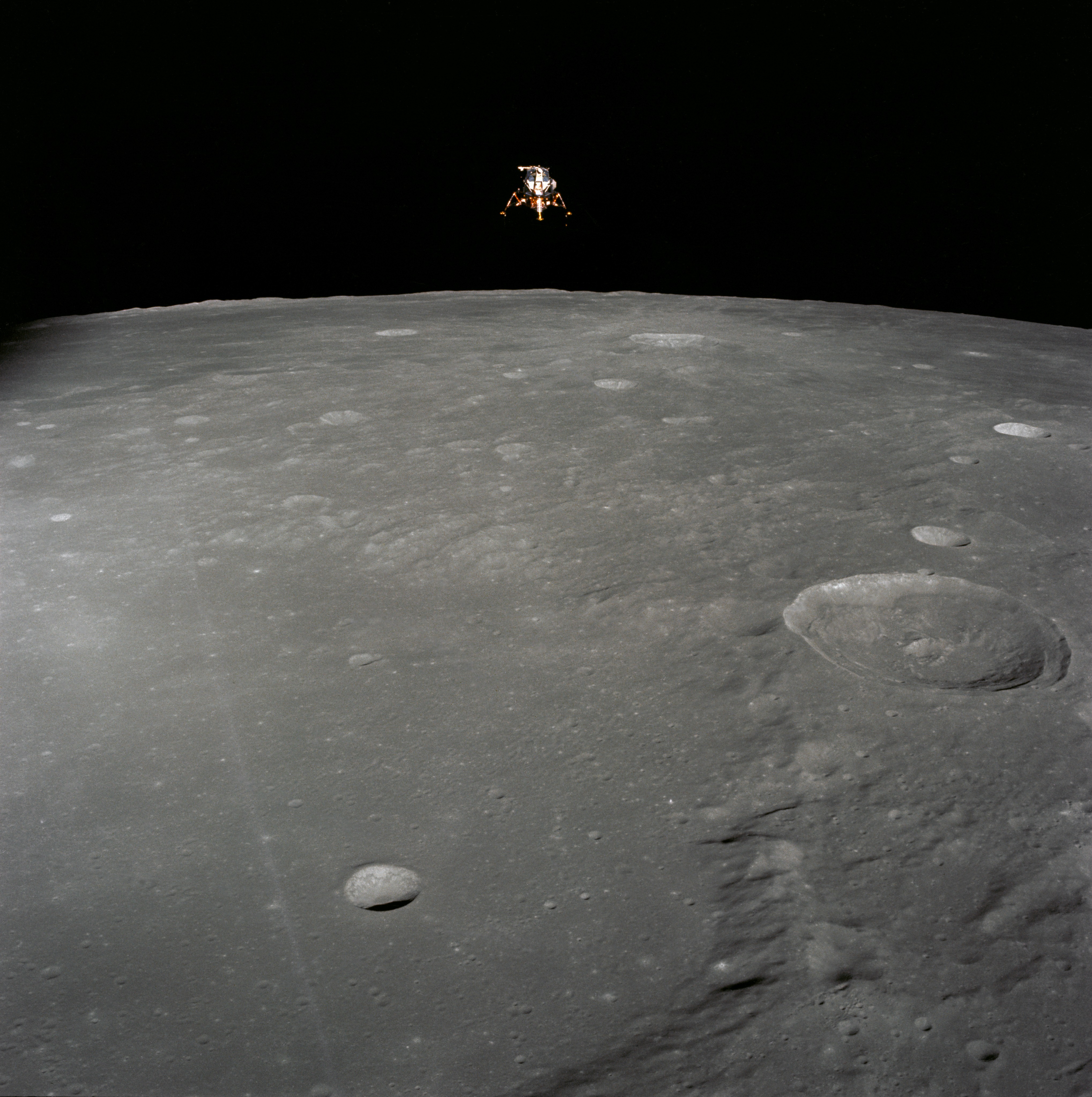 The Lunar Module Intrepid as seen from the Command Module Yankee Clipper shortly after undocking