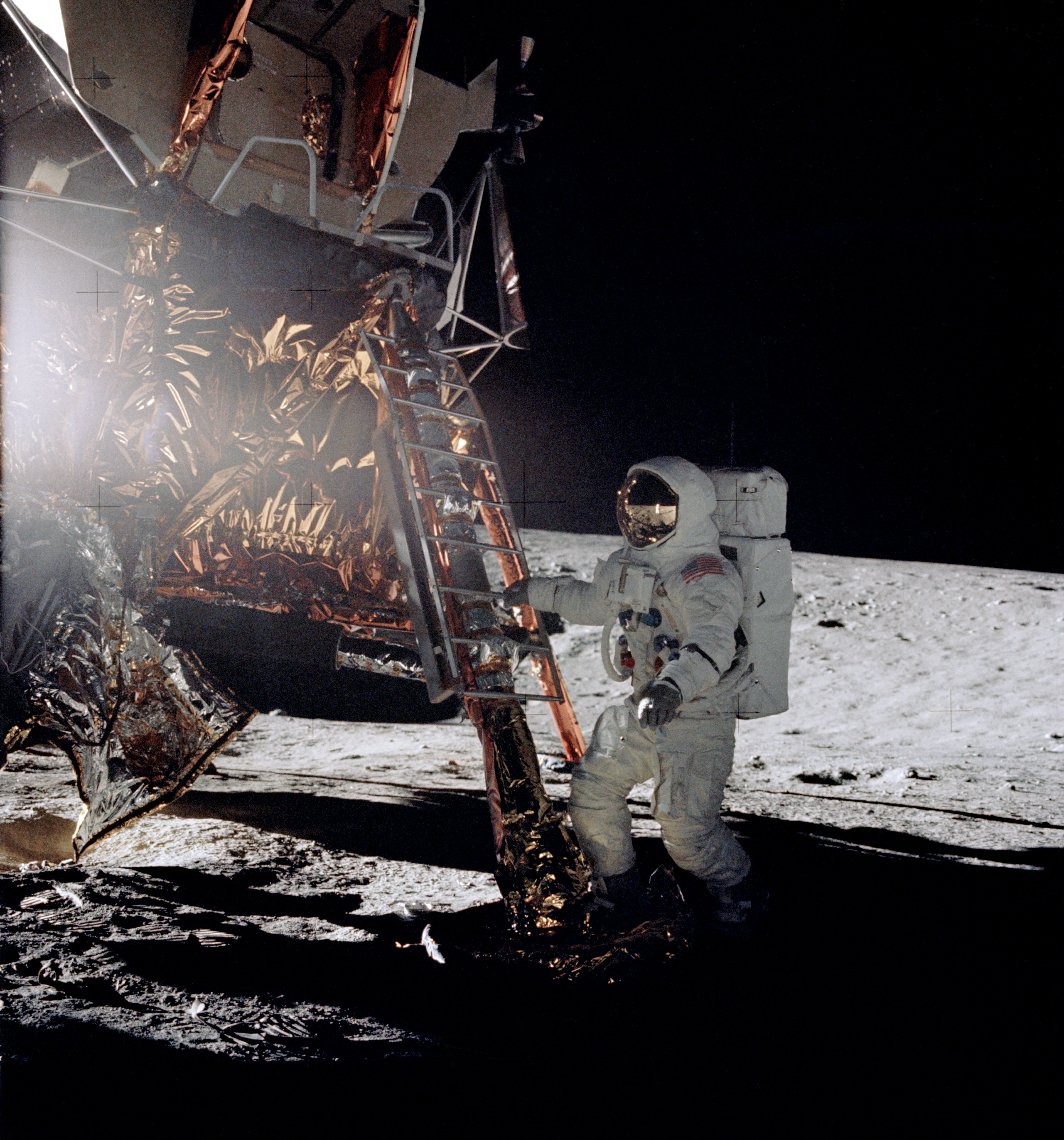 Alan L. Bean takes his first steps on the Moon