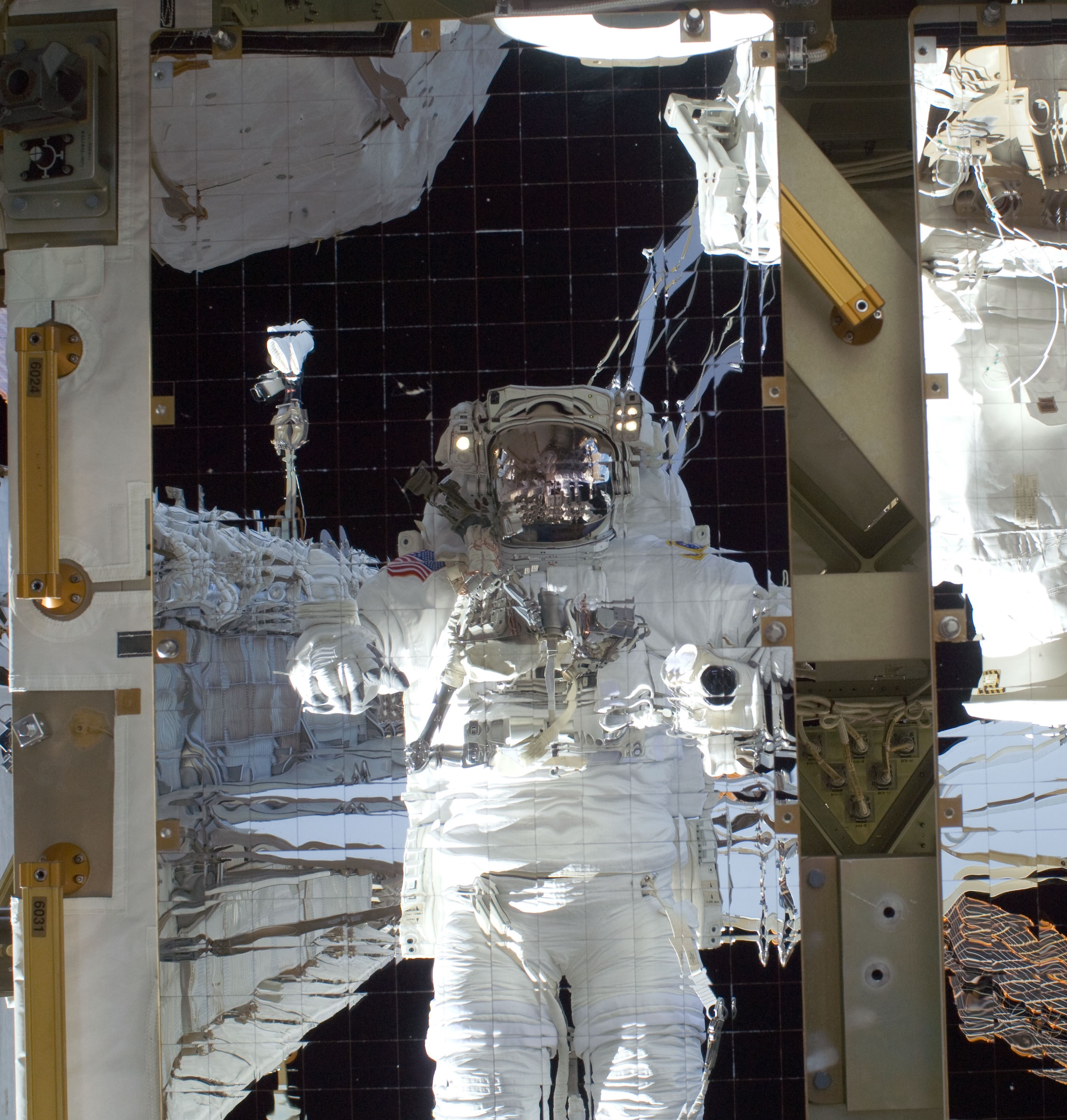 Satcher’s image reflected in a Z1 radiator panel