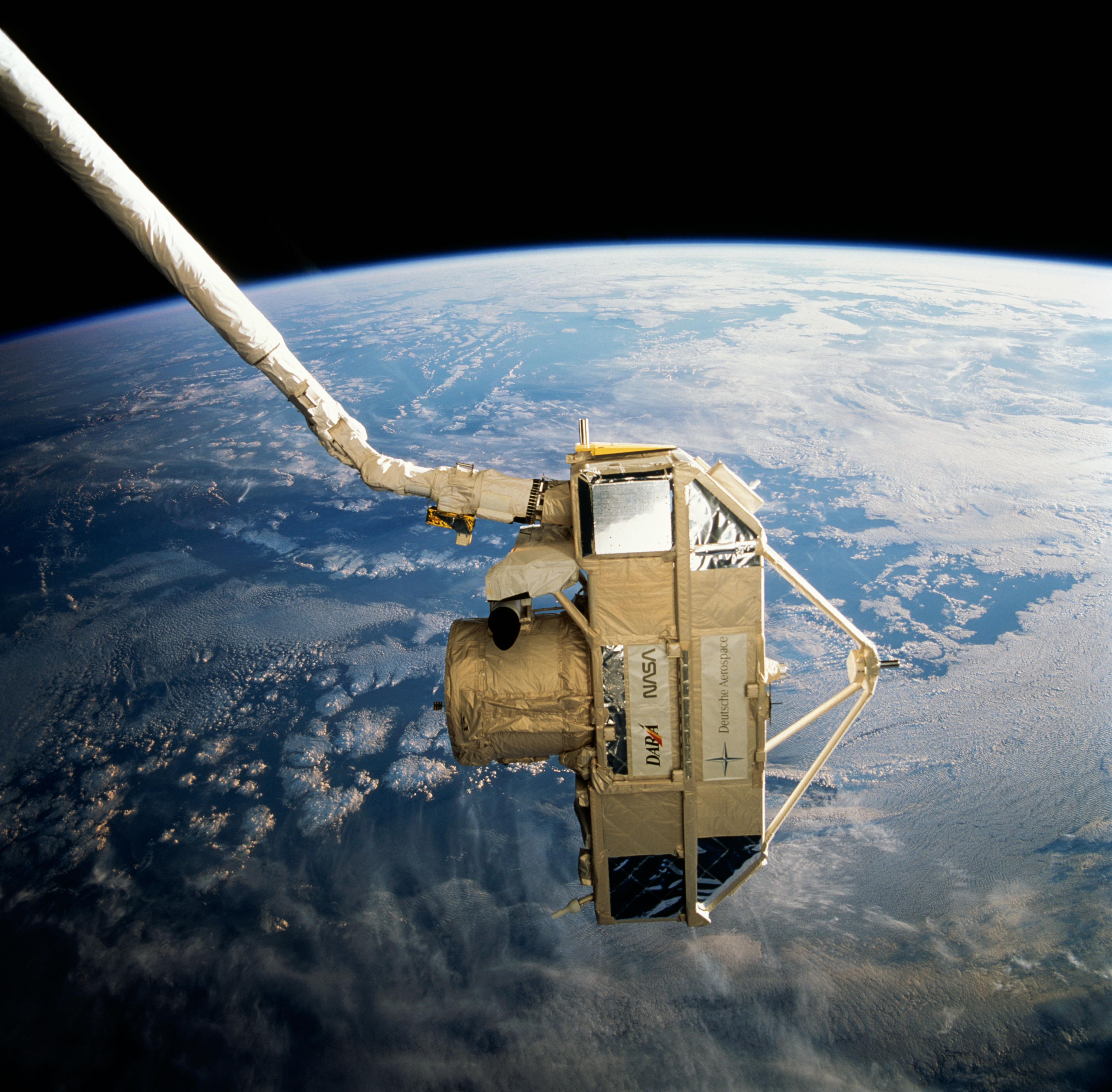 Ellen Ochoa uses the shuttle’s Remote Manipulator System to grapple CRISTA-SPAS following its eight-day free flight