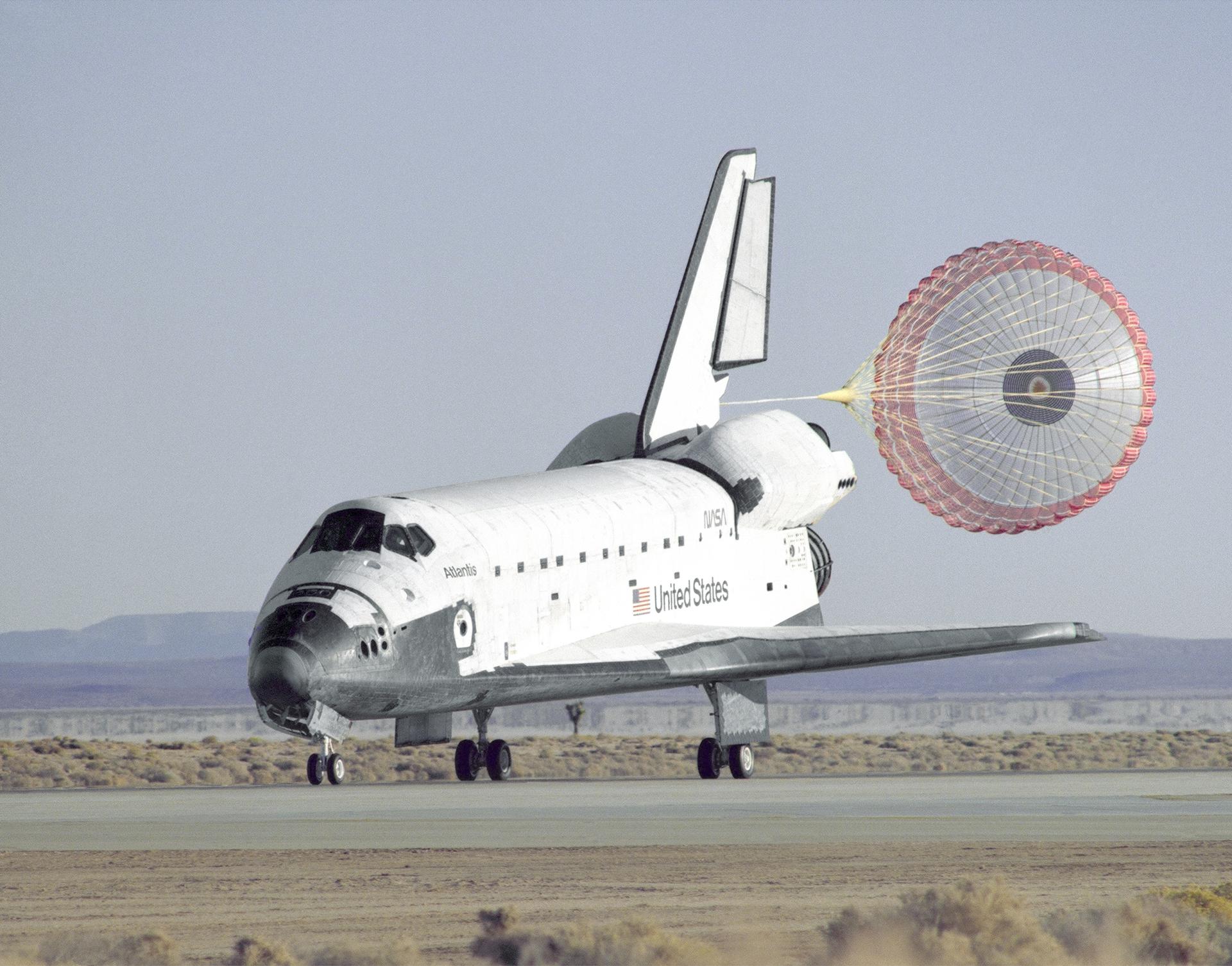 Atlantis deploys the first reusable space shuttle drag chute