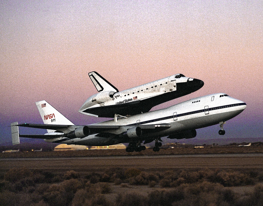 Mounted atop a Shuttle Carrier Aircraft