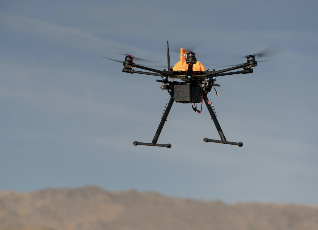 A drone is shown flying during a test of Unmanned Aircraft Systems Traffic Management (UTM) technical capability Level 2